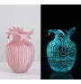 Un par de ParJarrón de vidrio rosa luminoso